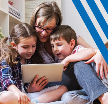 Mother reading to two children 